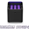 The room's ambience is enhanced with a black fixture projecting purple lights, featuring "Paradox Productions" and "844-727-2776" in a stylized font. Ideal for dynamic atmospheres, Flarecon-controlled lighting creates the perfect effect.