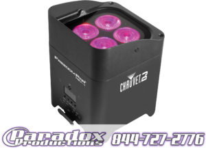 A black box with a pink light in it.