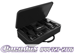 Black carrying case with custom foam inserts holding various equipment including a Chauvet Battery Pinspot 4 Pack, featuring the logo of Paradox Productions.